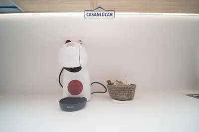 a white blender sitting on a counter next to a basket at Sanlucar Centro - Apartamento 2 in Sanlúcar de Barrameda
