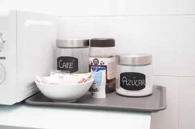 a shelf with spices and a bowl on it at Piso en el Barrio Alto in Sanlúcar de Barrameda