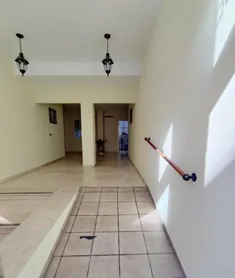 an empty hallway with a sword on the wall at Apto 5 personas con todo equipado in San Fernando