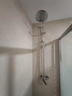 a shower in a bathroom with a shower head at Apto 5 personas con todo equipado in San Fernando
