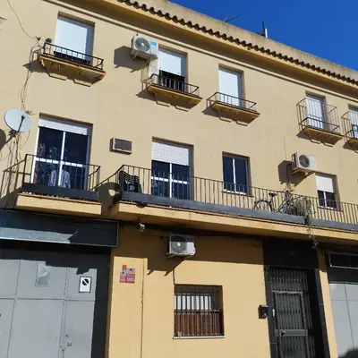 a building with balconies on the side of it at Apartamento ESPERANZA DE LA YEDRA in Jerez de la Frontera
