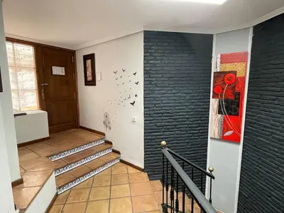 a bedroom with two beds and a large mirror at Magnifico Bungalow 2 plantas 110 m,con 3 piscinas in San Fernando