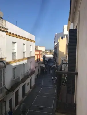 a view of an alley between two buildings at Piso Acogedor en pleno centro in El Puerto de Santa María