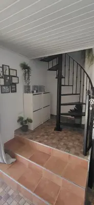 a room with a staircase and a stair case at VillaConil in Conil de la Frontera