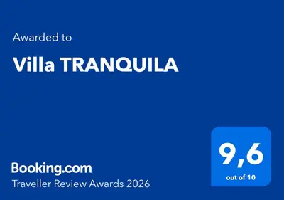 a blue sign with the text translated to villa tramulla at Villa TRANQUILA in Chiclana de la Frontera