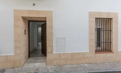 a building with a door on the side of it at Centro Villamarta Moderno in Jerez de la Frontera
