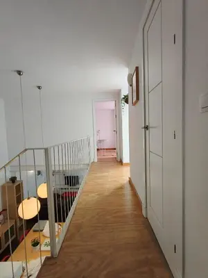 a hallway with a staircase leading to a room at Robles-Mercado in Cádiz