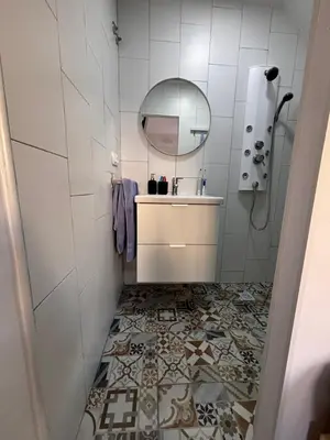a bathroom with a sink and a mirror at Aires de Sanlúcar in Sanlúcar de Barrameda