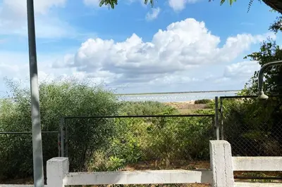 a view of the ocean from the beach at Apartamento Jara, playa, piscina, AC, Wi-Fi in Sanlúcar de Barrameda