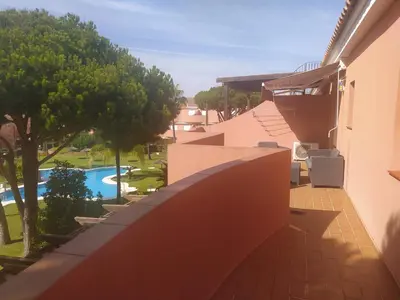 a view from the balcony of a house with a swimming pool at Áprtamento novo Santi Petri in Chiclana de la Frontera