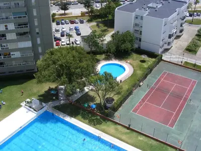 an aerial view of a pool in a apartment complex at Piso Con Hermosas Vistas Al Mar in El Puerto de Santa María