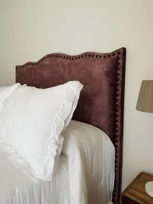 a hotel room with two beds with towels on the bed at H Nieves Playa in Chipiona