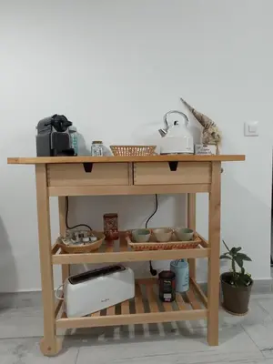 a wooden table with various items on it at Casa Encarnita in Arcos de la Frontera