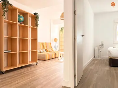a room with a living room with a couch at La Palmera Grupo AC Gestion in Cádiz