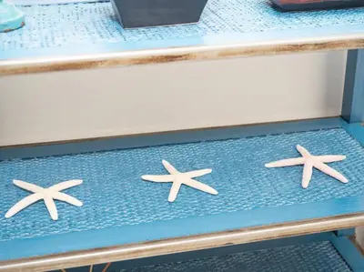four starfish on a blue bench on a boat at SibsSanlucar Calma - Centro y Playa - Nuevo in Sanlúcar de Barrameda