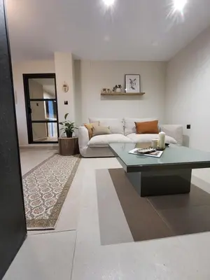 a living room with a couch and a table at Luxe Apartamento Duque de Alta in Arcos de la Frontera