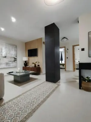 a living room with a couch and a table at Luxe Apartamento Duque de Alta in Arcos de la Frontera