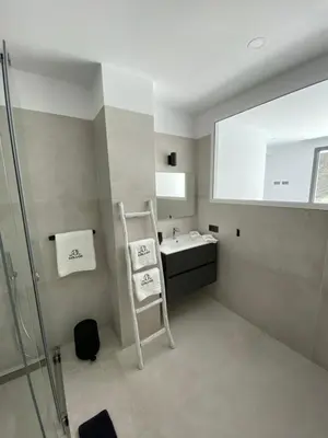 a bathroom with a sink and a shower at Mas del Cullou, moderne Villa in Andalusien, in der Nähe vom Meer in Cádiz