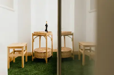 a room with a table and two tables and chairs at Casa Bahía in El Puerto de Santa María
