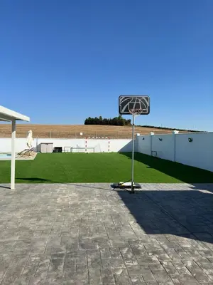 a basketball hoop in the middle of a park at Casa con piscina Sanlúcar de Barrameda in Sanlúcar de Barrameda