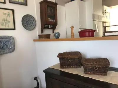 two baskets sitting on top of a counter in a kitchen at Apartamento primera linea de playa in Rota