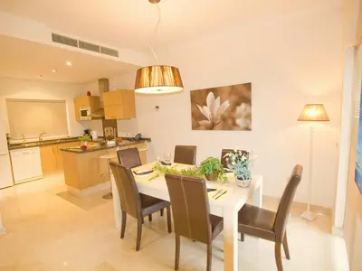a kitchen and dining room with a table and chairs at Villa 210 by Villamya in Arcos de la Frontera