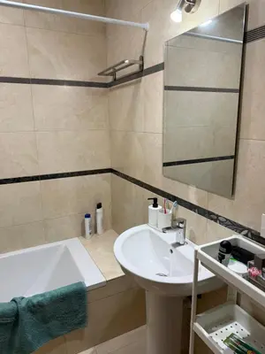 a bathroom with a sink and a bath tub and a sink at Piso completo en Chiclana de la Frontera in Chiclana de la Frontera