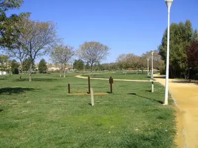 a park with a light pole in the grass at Life Apartments Costa Ballena in Costa Ballena