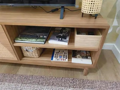 a wooden coffee table with books on it at AGR Apartamento Villapanés in Jerez de la Frontera