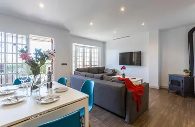 a living room with a couch and a table at 