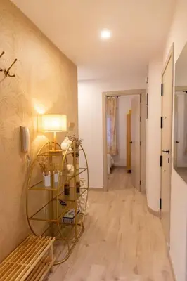 a room with a glass shelf and a hallway at Arenas de la Victoria by Gades Gestión in Cádiz