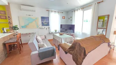 a bathroom with a shower and a sink and a mirror at El Baluarte by Sanlúcar Housing in Sanlúcar de Barrameda