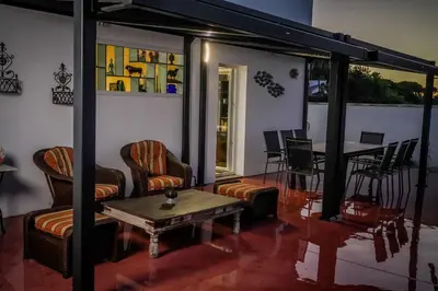 a bathroom with a black sink and a mirror at Spacious villa with pool in Chiclana de la Frontera in Chiclana de la Frontera