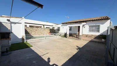 a living room with a couch and a table at Villa Ojos Del Océano in Cádiz