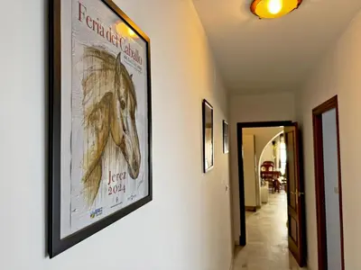 a picture of a horse hanging on a wall at Apartamento Las Palmeras - Ole Solutions in Jerez de la Frontera