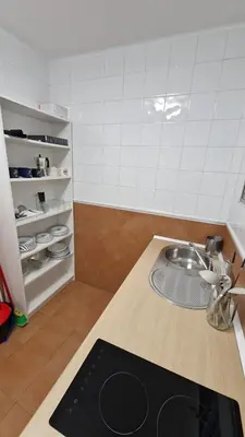 a kitchen with a sink and a counter top at Doña Violeta con jardin Grupo AC Gestion in Novo Sancti Petri