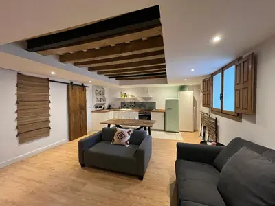 a living room with a couch and a table at Loft Abril Grupo AC gestion in Cádiz