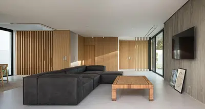 a living room with a couch and a coffee table at Hostidy Villa Horacia Resort in Sanlúcar de Barrameda