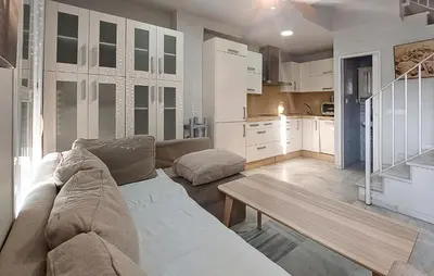 a living room with a couch and a table at Awesome Home In Rota With Wifi in Rota