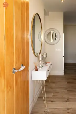 a bathroom with a sink and a mirror at Penthouse Plaza San Antonio Grupo AC Gestion in Cádiz
