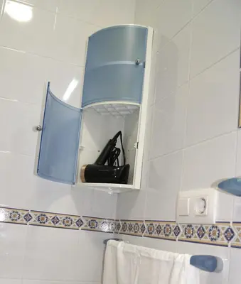 a mirror on the wall of a bathroom at Rincón Centro exclusive in Jerez de la Frontera