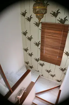a view of a room with a bed and a window at Vive Sanlúcar con aparcamiento en la puerta in Sanlúcar de Barrameda