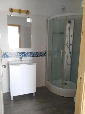 a bathroom with a sink and a shower at ALOJAMIENTo RURAL IZAN in Conil de la Frontera
