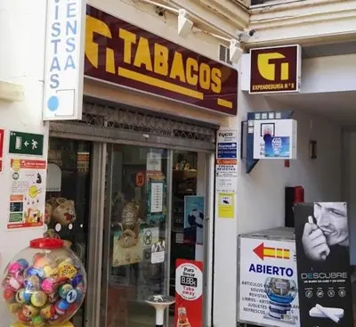 a taacco store with a sign on the front of it at EXCLUSIVE APARTMENT 3 HAB Wifi in Rota