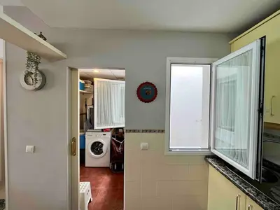a kitchen with a sink and a window at EXCLUSIVE APARTMENT 3 HAB Wifi in Rota