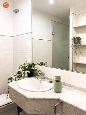 a bathroom with a sink and a mirror at Miramar Grupo AC Gestion in Cádiz