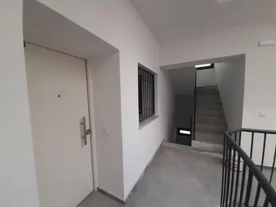 a stairway with a door and a stair case at Casa Parque Genovés junto a la playa in Cádiz