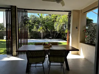 a dining room table and chairs in a house at Casa singular completamente reformada in El Puerto de Santa María