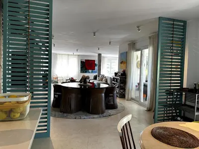 a living room with a tub in the middle of a room at Casa singular completamente reformada in El Puerto de Santa María