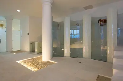a large room with columns and a basketball hoop at Iberostar Selection Andalucia Playa in Chiclana de la Frontera